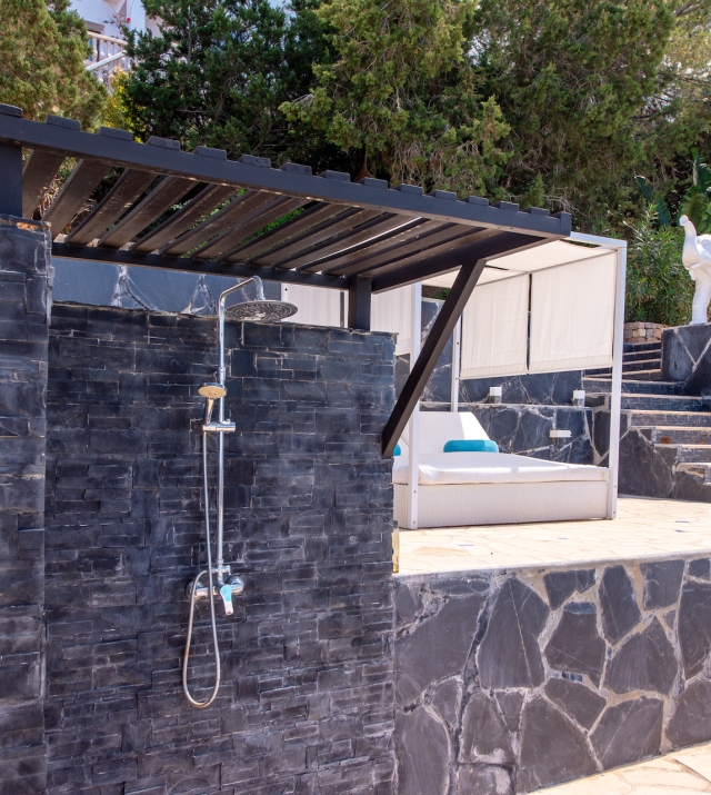 Resa estates Ibiza san Jose te koop villa main exterior shower.jpg